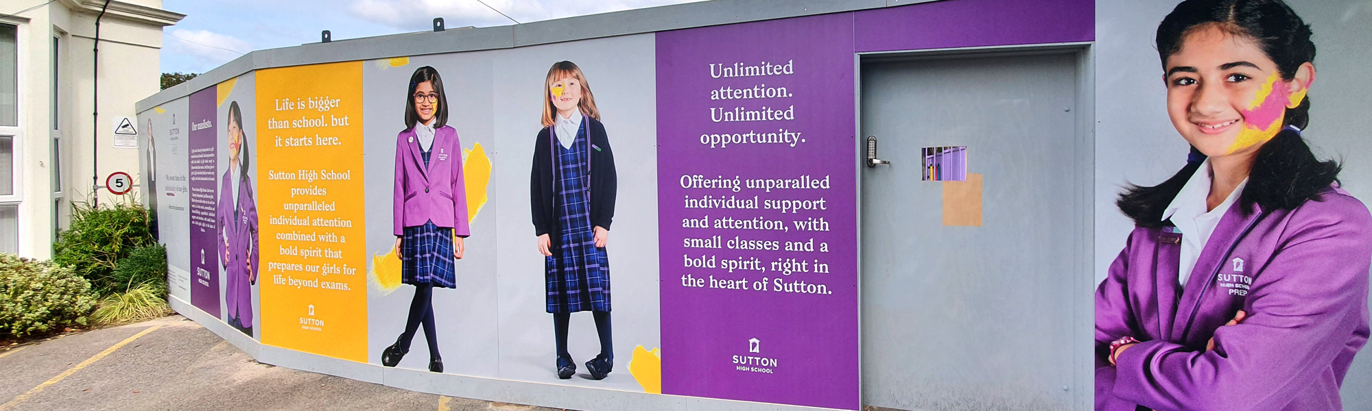 Colourful school hoarding graphics